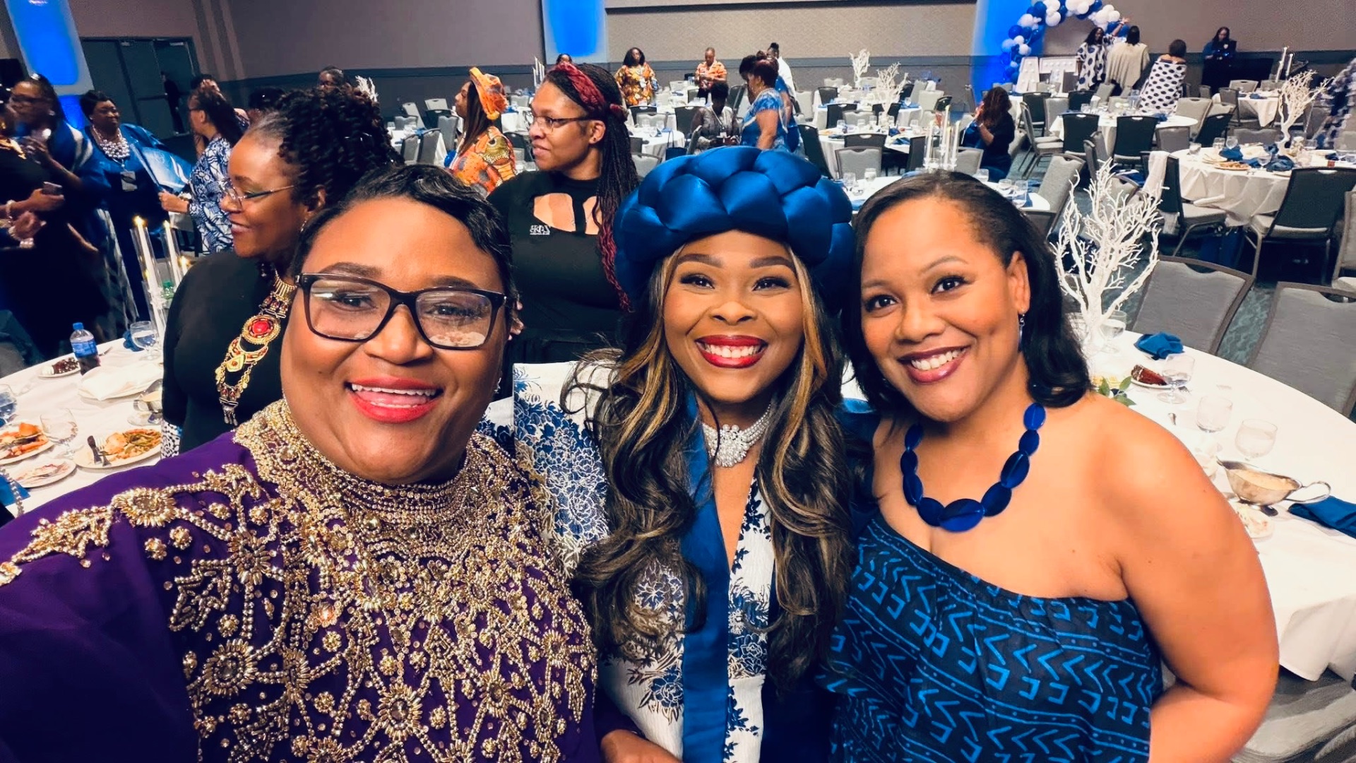 Latoya Jeeter with two sorors at an evening Zeta Phi Beta gala